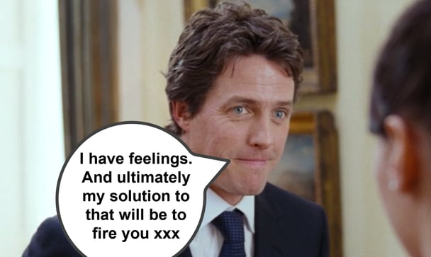 Hugh Grant in a suit as the prime minister in Love Actually.