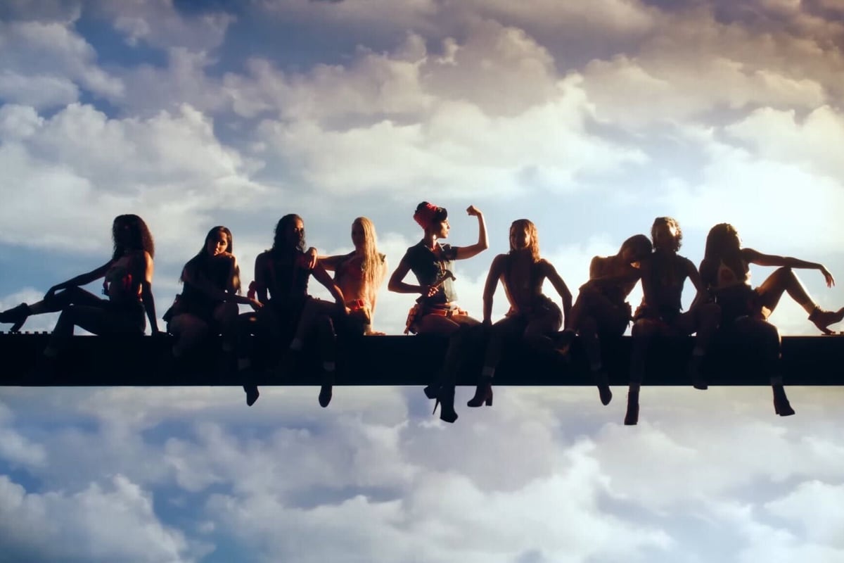 Katy Perry recreates the iconic 1932 photograph titled 'Lunch Atop A Skyscraper.' 