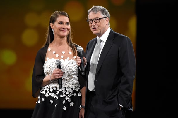 Melina and Bill Gates on stage together. 