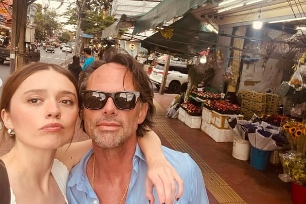 Aimee Lou Wood and Walton Goggins take a selfie behind-the-scenes of The White Lotus Season 3.