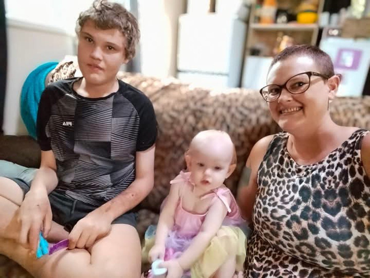 mother with her teen son and baby daughter