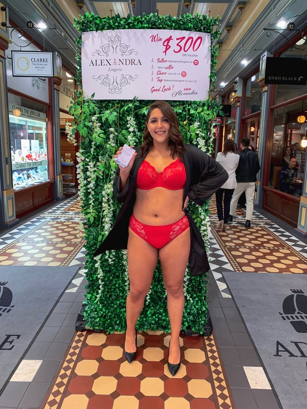 Alexia wearing red plus size lingerie in Rundle Mall.