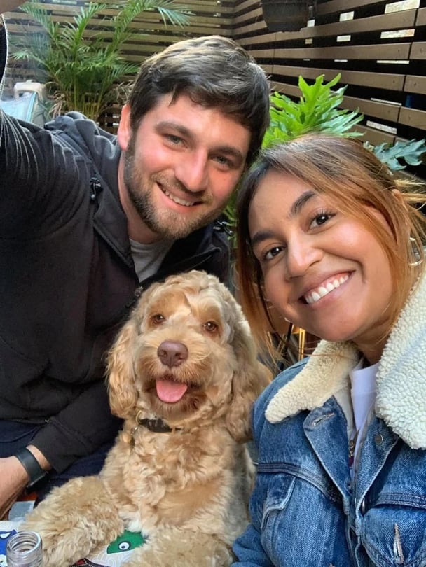 Themeli Magripilis with wife Jessica Mauboy and theor dog posing for a photo.