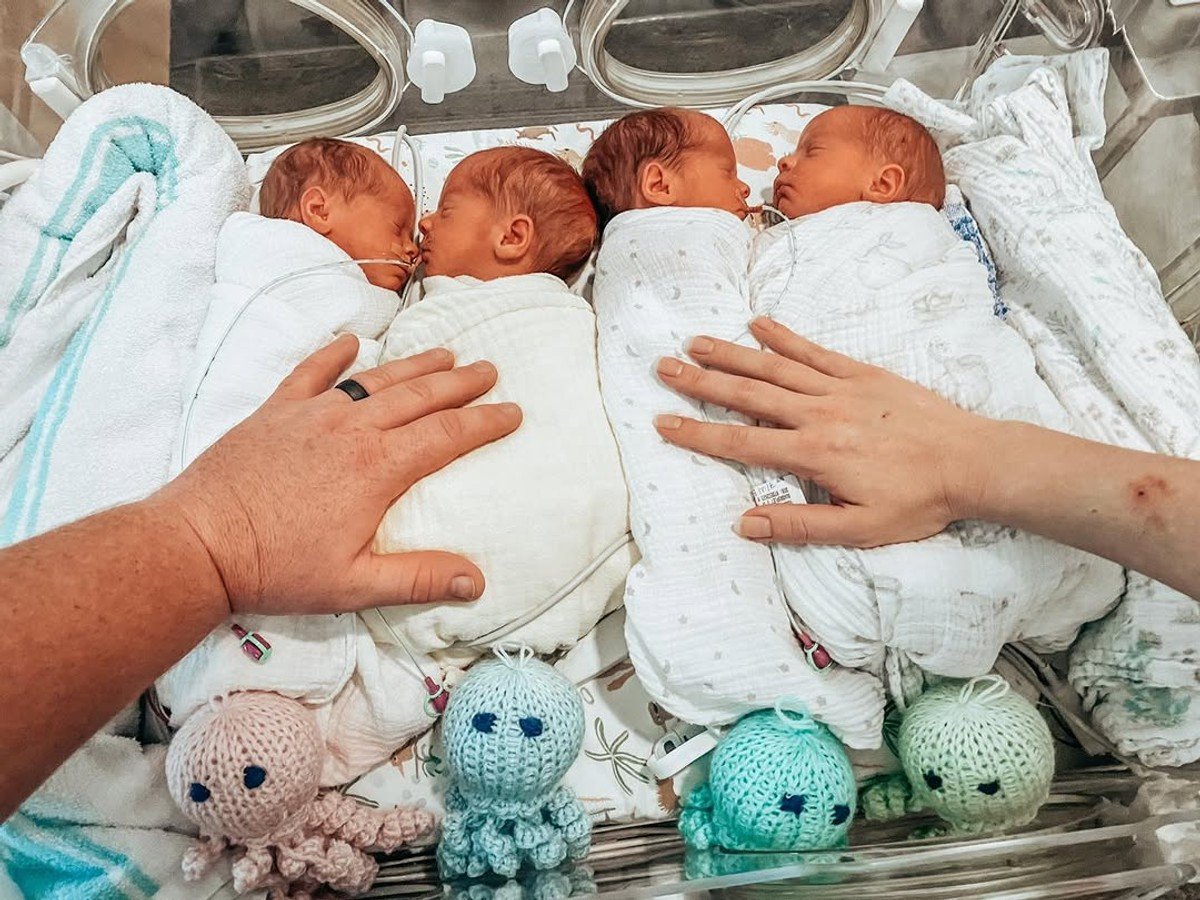 Four newborn babies in hopsital.