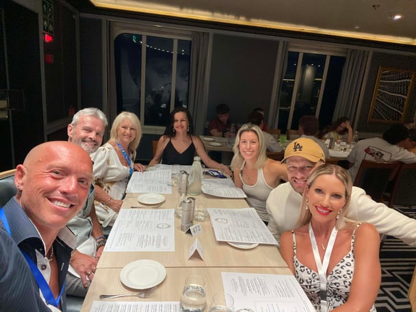 A group of adult's table for a meal on board Carnival Cruise. Image: Supplied.