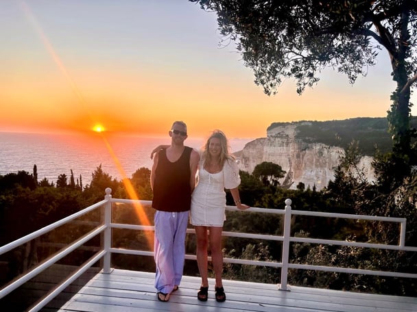 mand and woman watching a sunset at Erimities Paxos