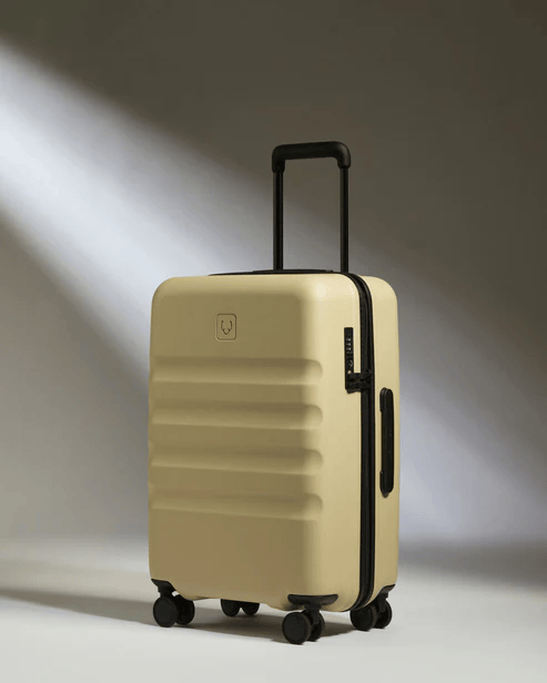 dune-yellow suitcase from Antler