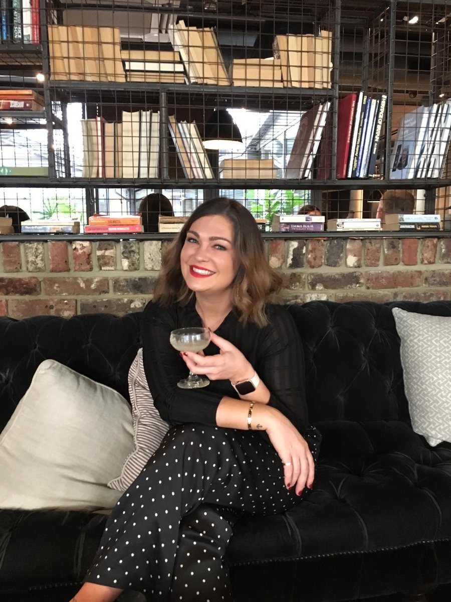 Photo of Ashleigh Butterss in London, drinking a margarita, before getting sober.