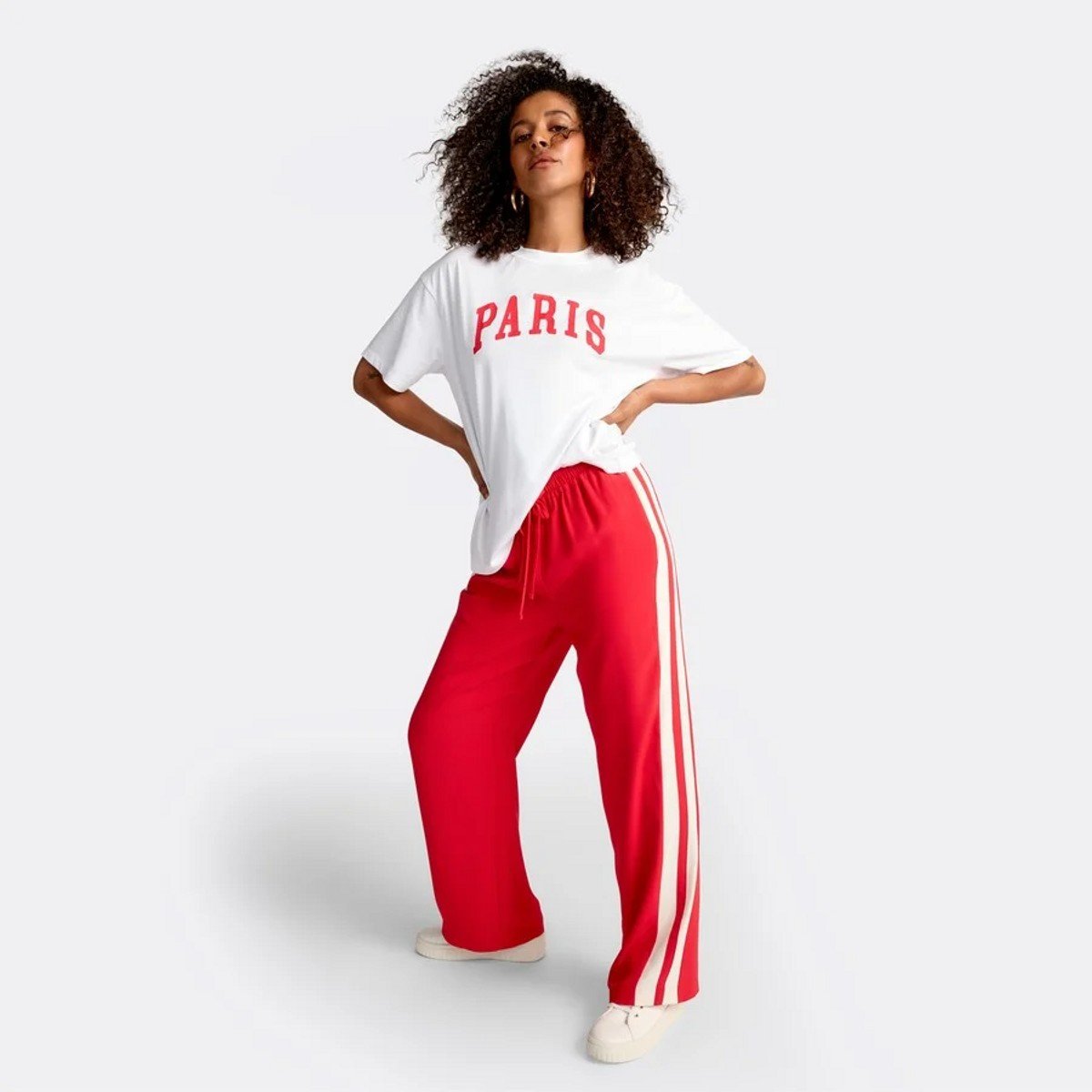 woman wearing red and white stripe pants from Big W 