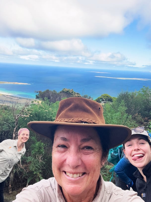 Leonie at Blue Seat, a well-known resting point located on the Mt Strzelecki on Flinders Island, Tasmania.