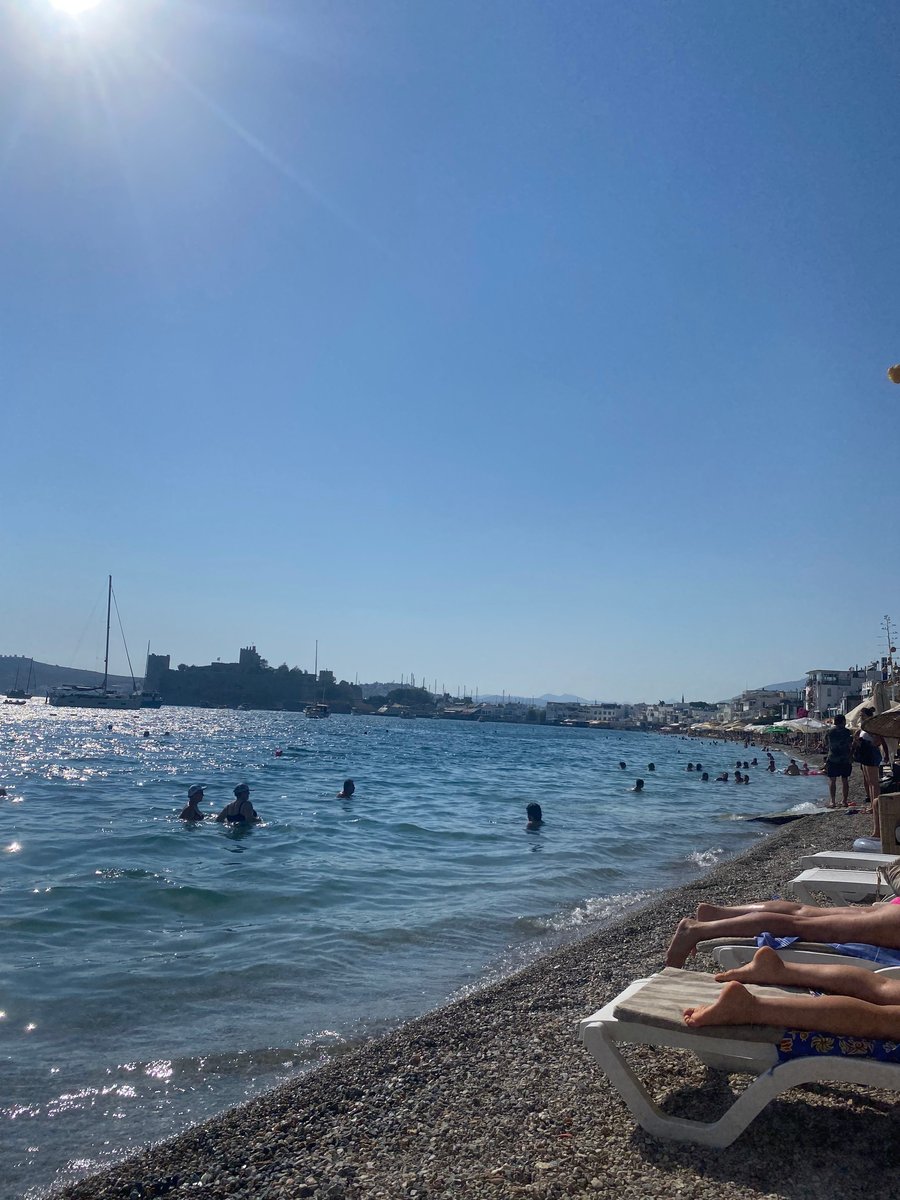 Beach in Bodrum featuring sunbeds.