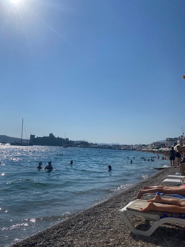 Beach in Bodrum featuring sunbeds.