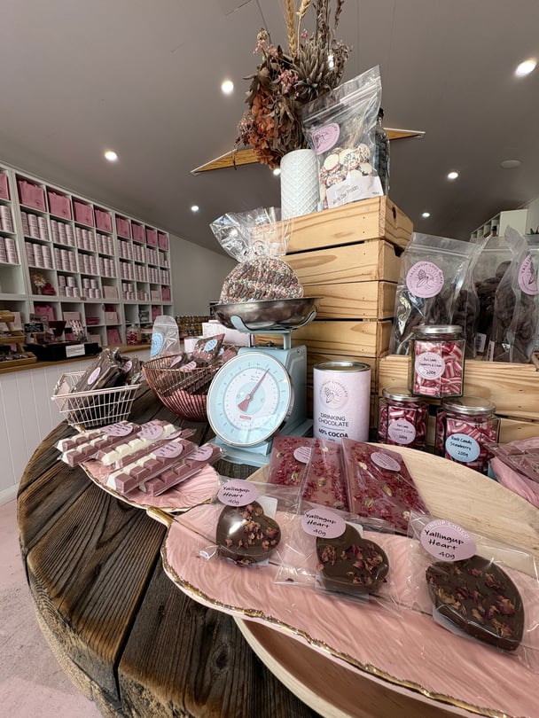 Assorted chocolates on a shop table at Yallingup Chocolate.