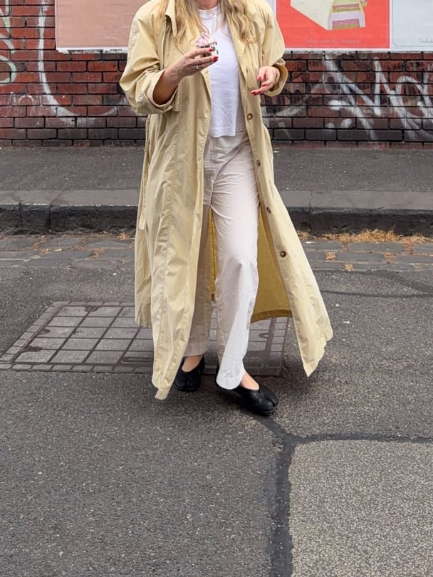 Ali wearing cotton pants from Deiji Studioes paired with white top and tabi shoes.