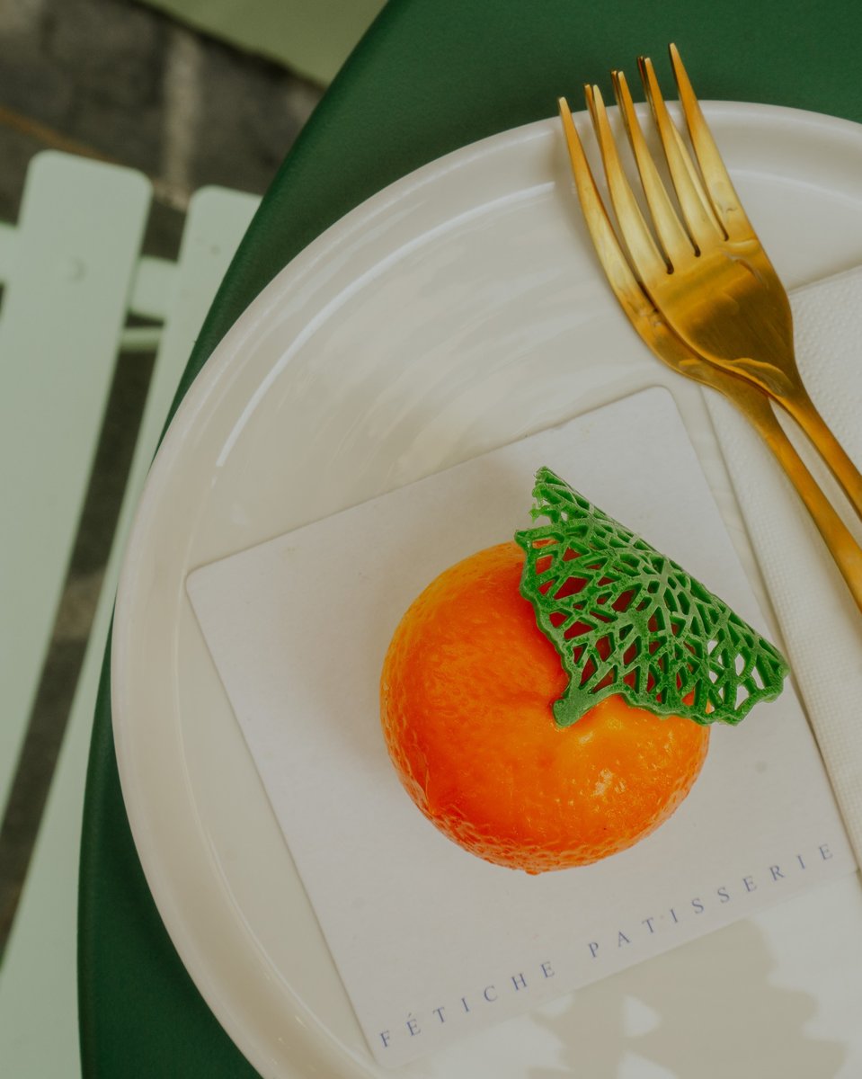 A dessert from Fetiche Patisserie Ljubljana. A tart in the shape of an orange.