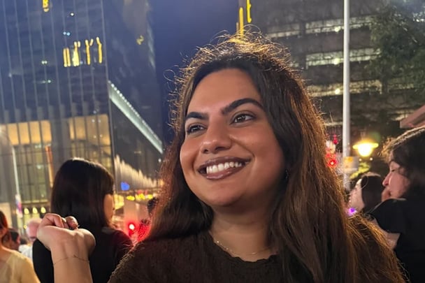 Emily Vernem showing a photo with the Milani Make it last matte setting spray on her face.