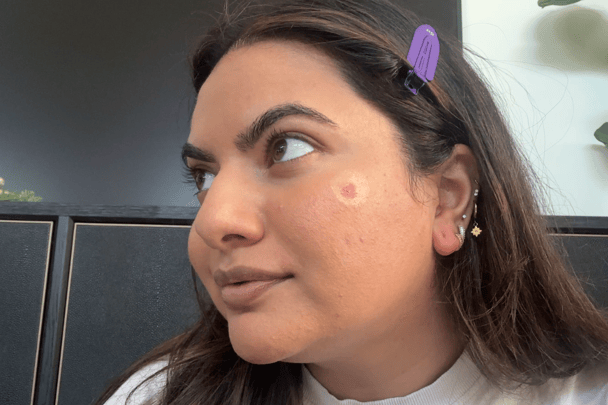 Em Vernem showing what the glaxed donut blush looks like before blending.