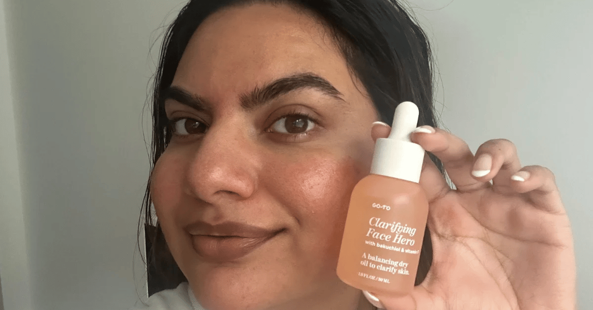 Emily Vernem holding Go-To's new Clarifying Face Hero. 