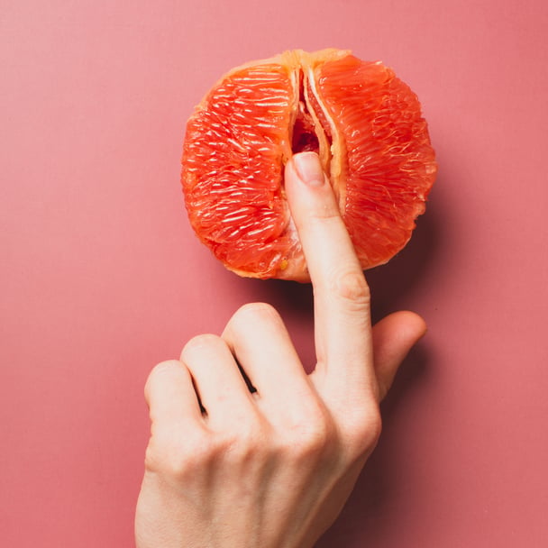 Woman and a papaya.