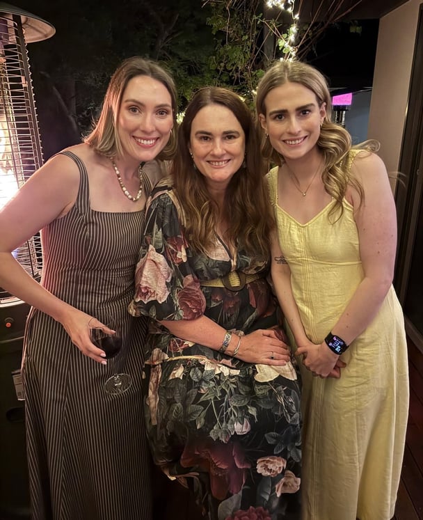 Emma at her step-son’s wedding with two of her three children, daughters Hannah and Sophie Robertson.