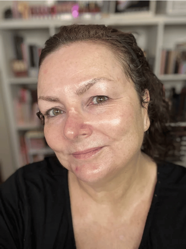 Beauty writer Teresa McNamara shows off her glowing skin in a selfie.