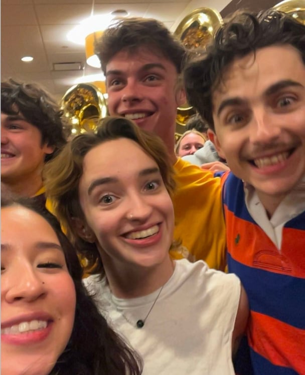 Timothee Chalamet takes a selfie with students at the University of Minnesota. 