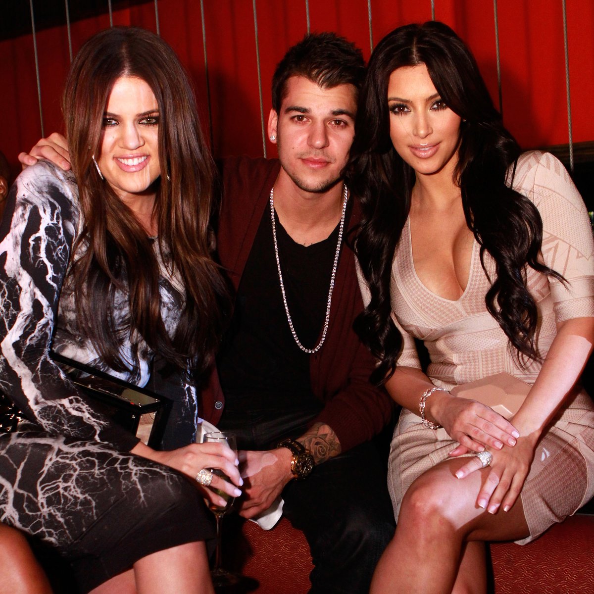 Khloe Kardashian, Rob Kardashian and Kim Kardashian in 2011