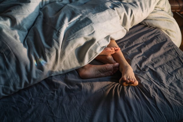 Couple in bed.