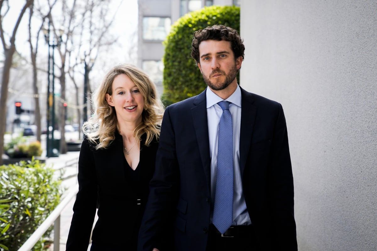 Elizabeth Holmes alongside her partner Billy Evans.