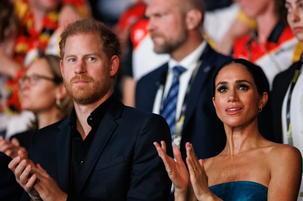 Prince Harry and Meghan Markle attend an event after leaving life as working royals. Image: Getty.