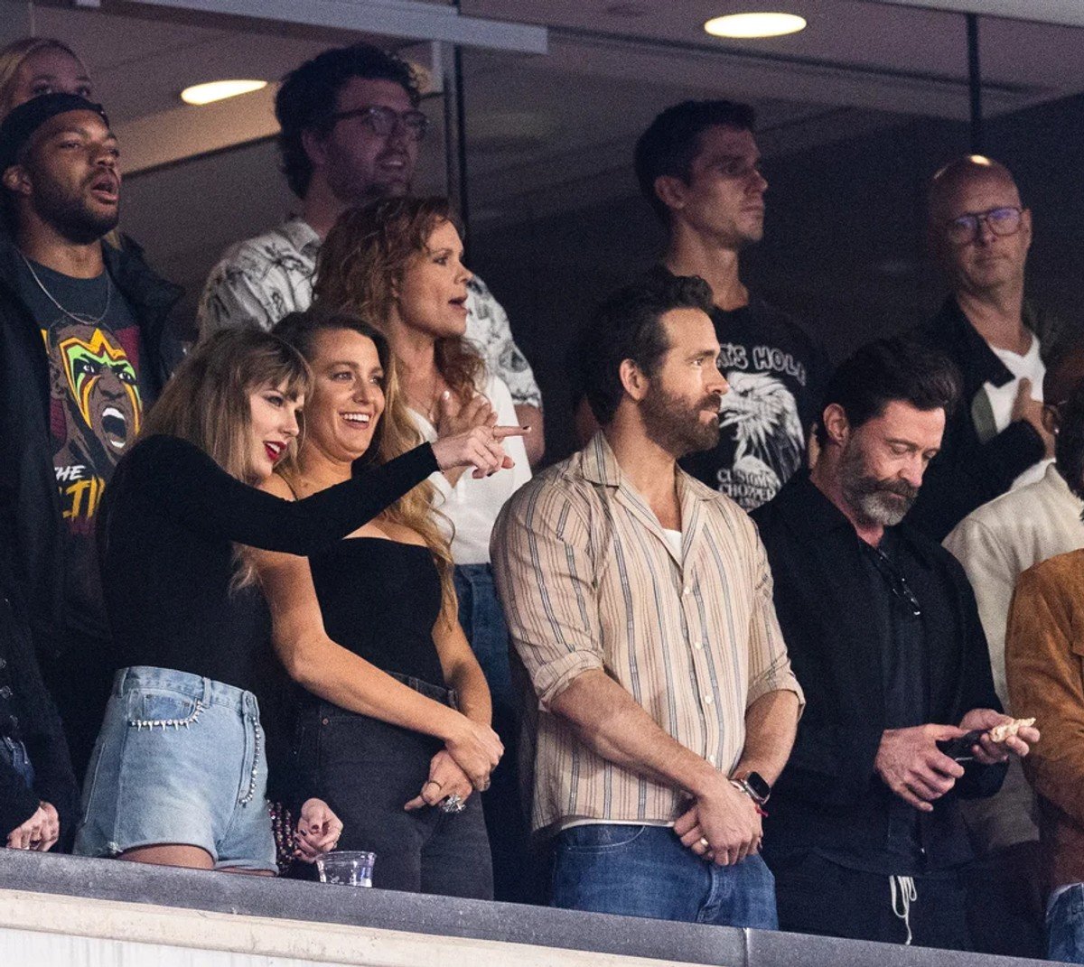 Taylor Swift, Blake Lively, Ryan Reynolds and Hugh Jackman watch the Kansas City Chiefs play in 2023.