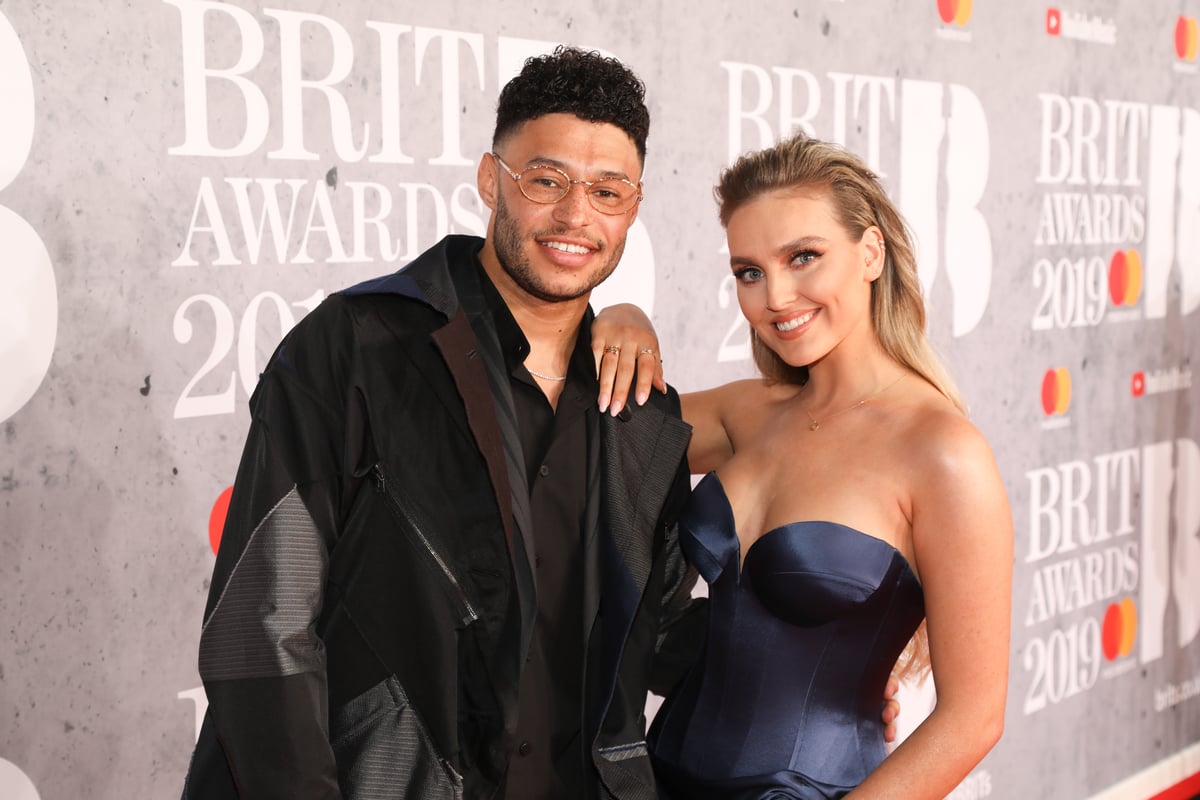 Alex Oxlade-Chamberlain and Perrie Edwards. Image: Getty