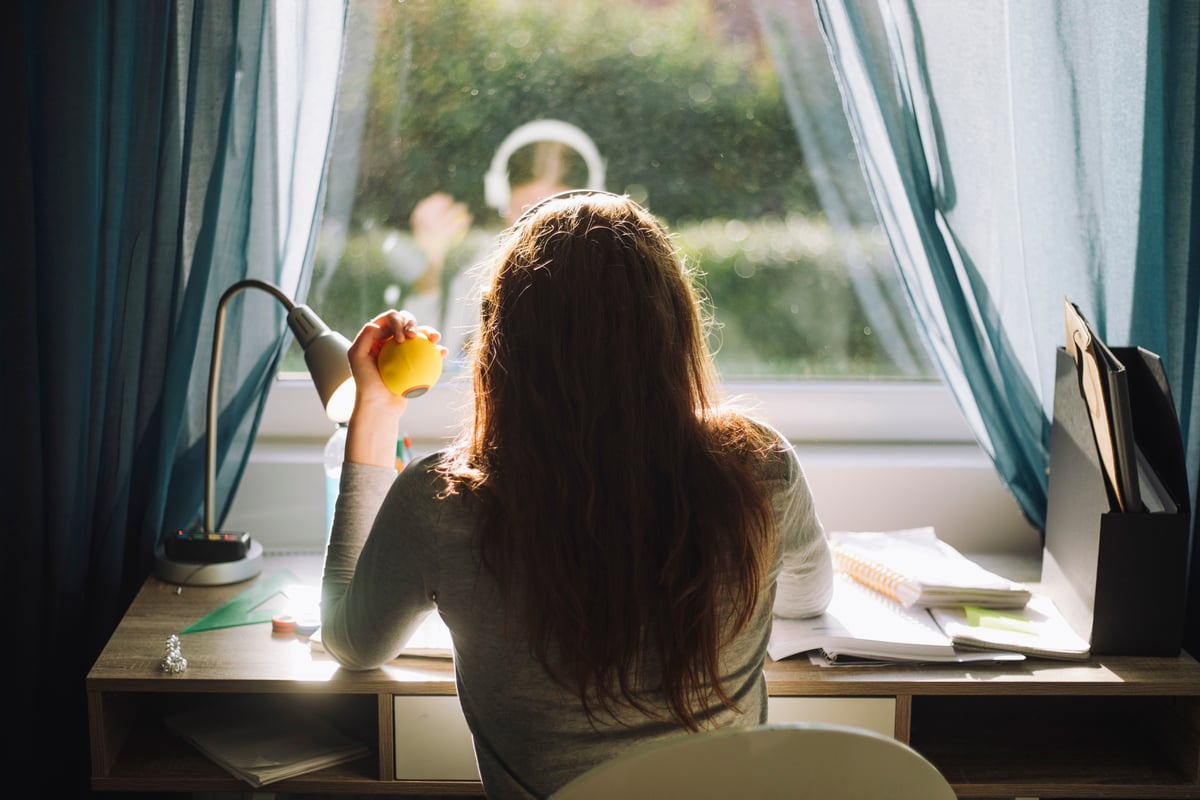 A woman sitting at her desk. 