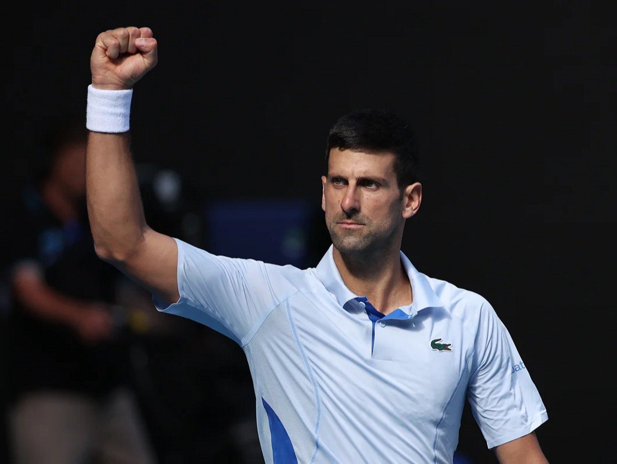 Novak Djokovic of Serbia celebrates winning the third set in their Semifinal singles match against Jannik Sinner of Italy during the 2024 Australian Open