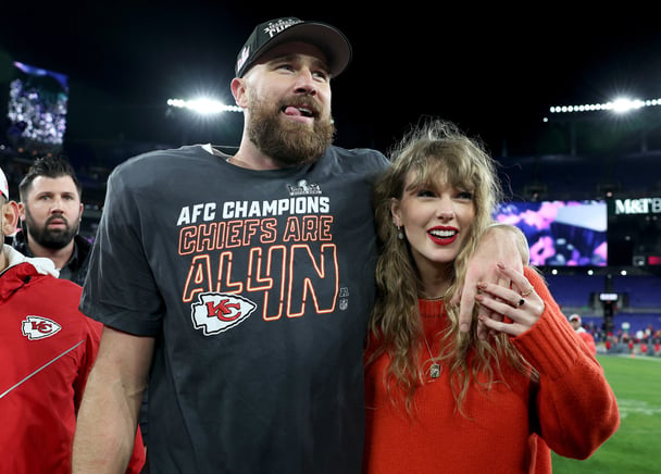 Travis Kelce and Taylor Swift at his NFL game.
