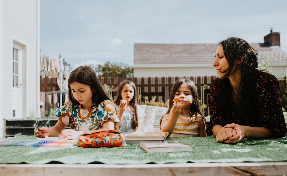 A mother with her three children