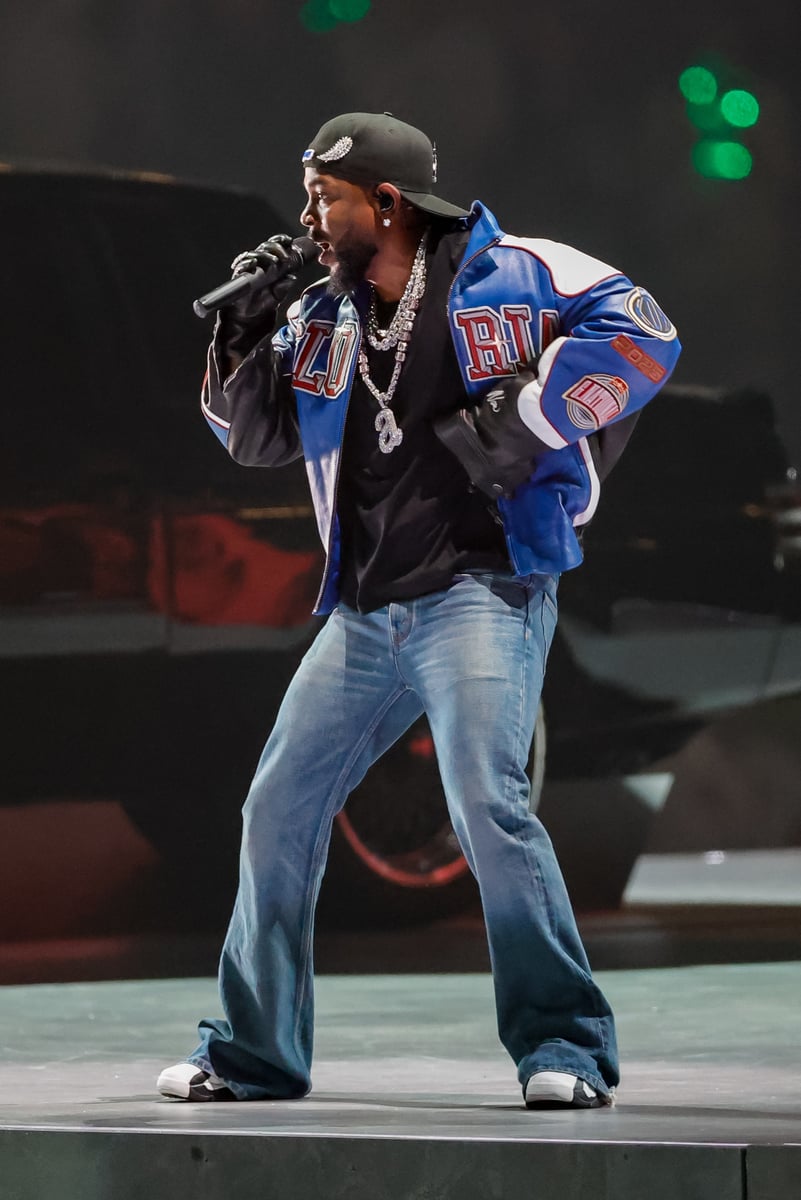 Kendrick Lamar wears Celine flares while performing at The Superbowl