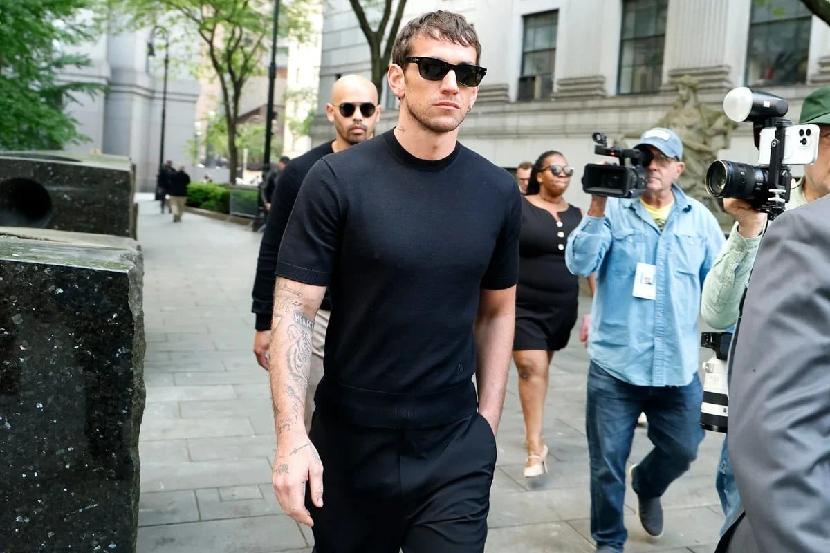 Alex Fine exiting the courthouse after opening statements. 