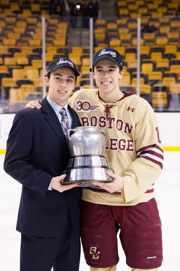 Johnny Gaudreau #13 and Matthew Gaudreau #21 of the Boston College Eagles celebrate after the Eagles beat the Northeastern University Huskies. 