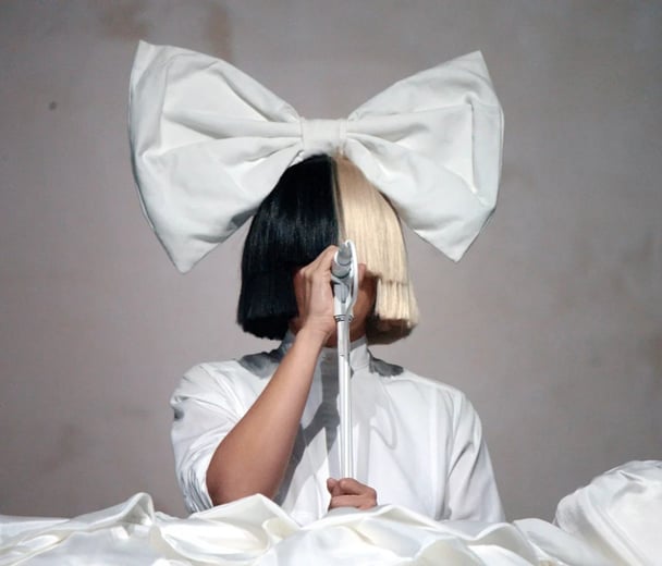 Sia performs onstage at 2016 Coachella.