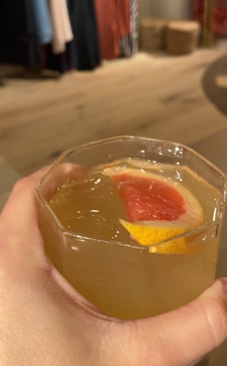 Author with a paloma tequila cocktail.