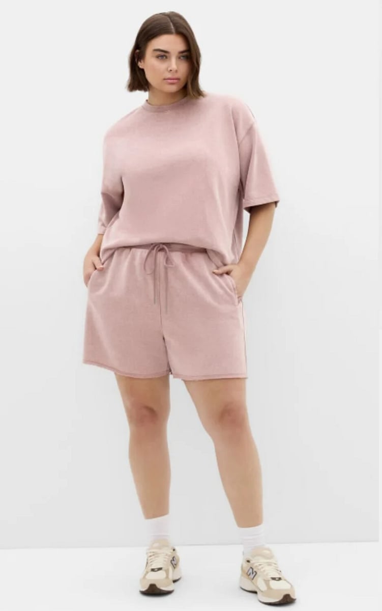 woman wearing a pink set 