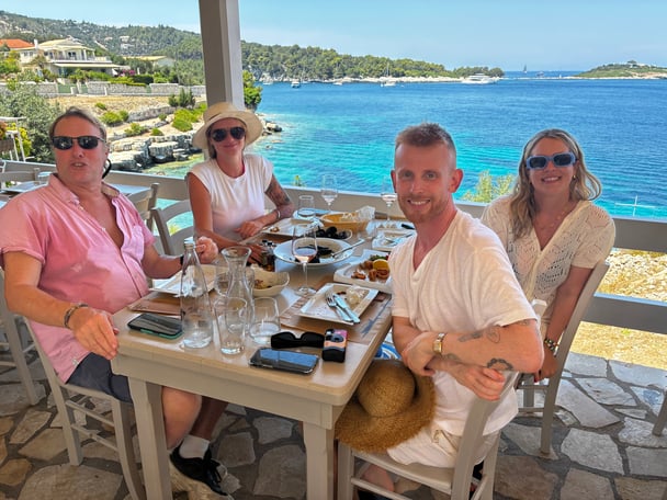 people eating at a restaurant on Paxos
