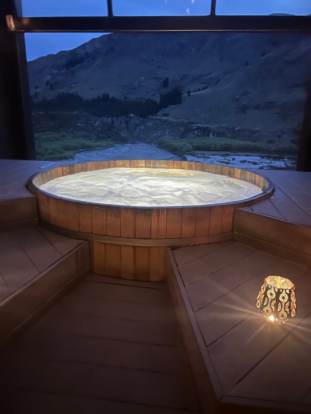The Onsen Hot Pools: a wooden tub filled with hot, foaming water.