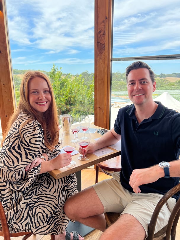 Mamamia writer Amy Clark enjoying wine at Montalto winery with her husband.