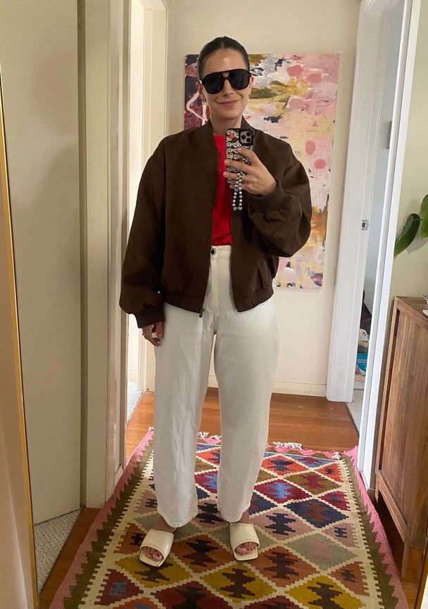 Author wears a chic casual outfit.