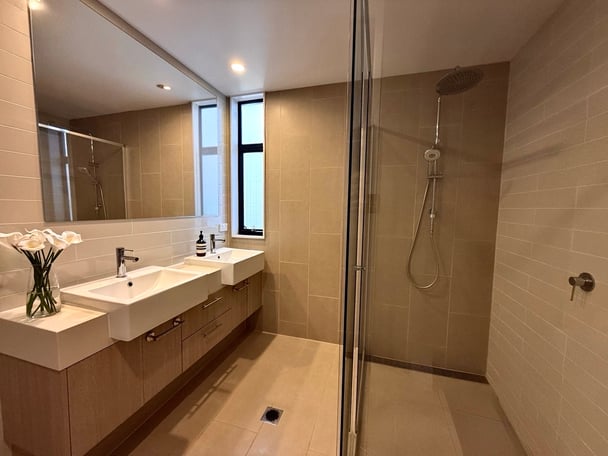 The bathroom includes double sinks and large shower. Image: Supplied.