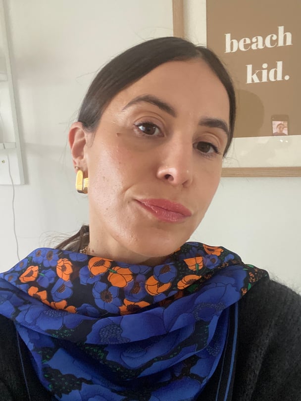 Wearing Natio Lip Colour Crayon in Petal.