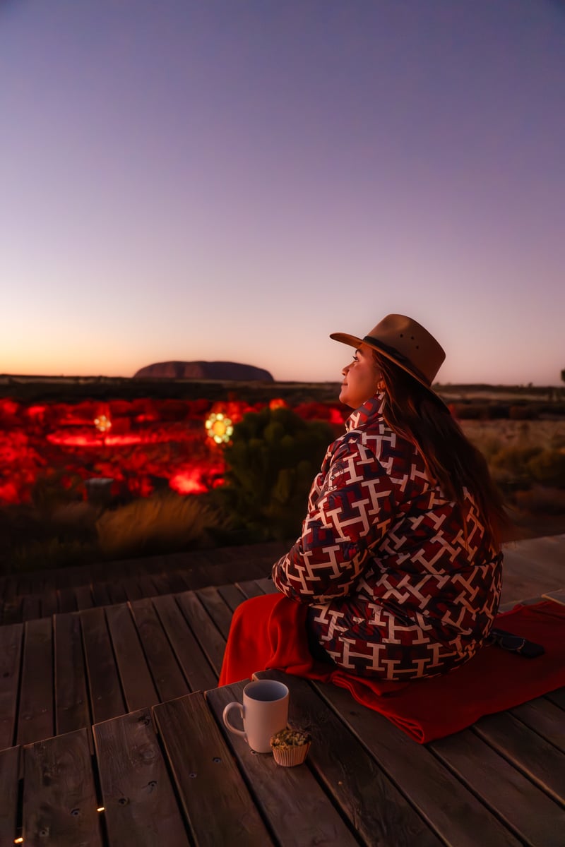 Jessica Mauboy watches an Uluru sunrise.