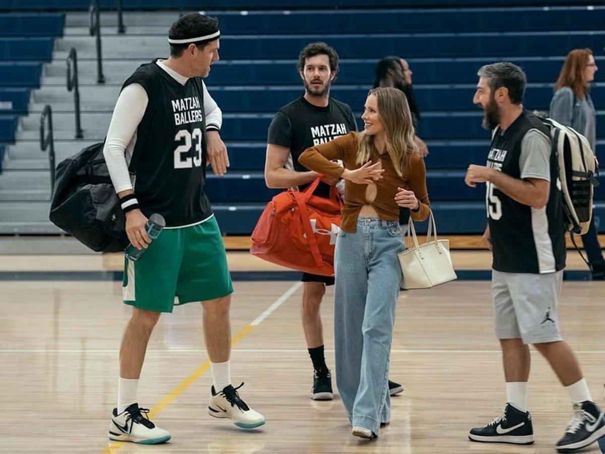 A still from Nobody Wants This featuring Joanne in cut-out top and jeans.